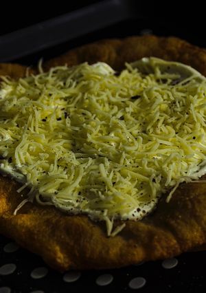 A picture of “Langos” The Hungarian fried bread.