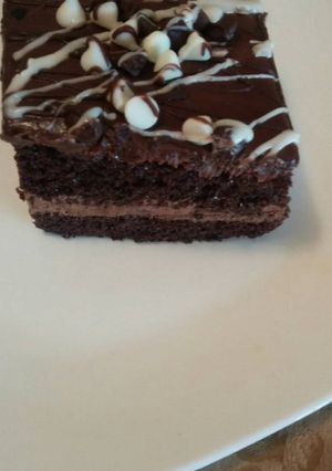 Una foto de Cake de café y crema chantilly de chocolate