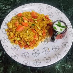 A picture of Carrot Khichdi with Curd masala Kadi.