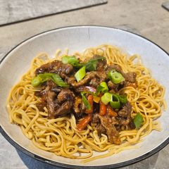 A picture of Crispy chilli beef noodles.