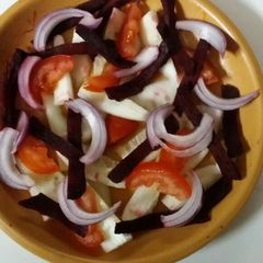 A picture of Beetroot cucumber salad.