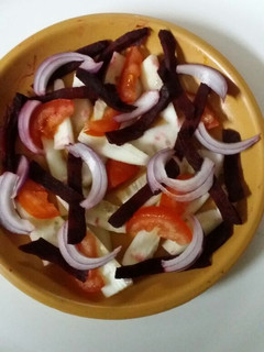 A picture of Beetroot cucumber salad.