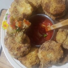A picture of Pilchards and potato cutlets.