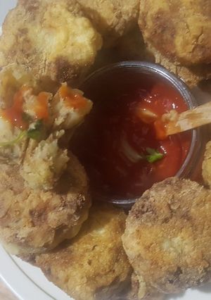 A picture of Pilchards and potato cutlets.