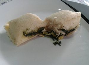 Una foto de Tamales de espinacas con queso