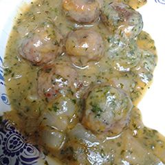 A picture of Cheesy sausageball onion casserole.