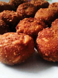 A picture of cheesy potato meatball.