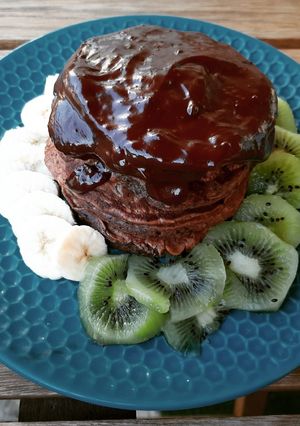 Une photo de Pancakes muesli, banane, chocolat