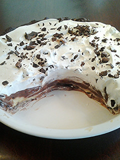 A picture of Vanilla and Chocolate Cream Pie with a Chocolate Lined Pastry Crust.