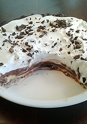 A picture of Vanilla and Chocolate Cream Pie with a Chocolate Lined Pastry Crust.