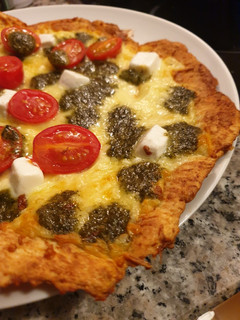 Una foto de Popizza de pesto 🍕