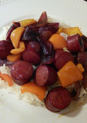 A picture of Polish Sausages With Onions and Sweet Peppers.