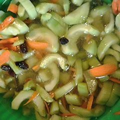 A picture of Cucumbers and carrots.