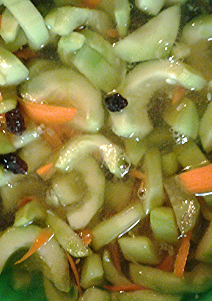 A picture of Cucumbers and carrots.
