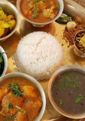 A picture of Dal Bhat (lentils with rice) (Nepal).