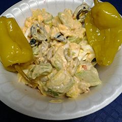 A picture of Egg avocado and olive salad.