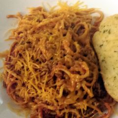 A picture of Spaghetti with Pepperoni.