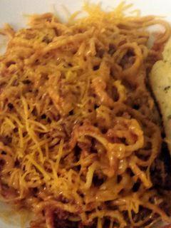 A picture of Spaghetti with Pepperoni.