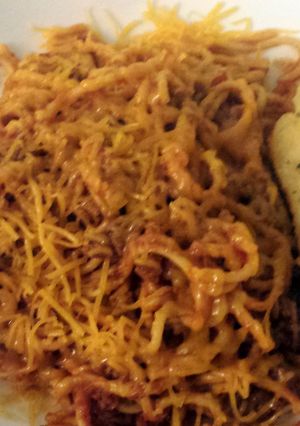 A picture of Spaghetti with Pepperoni.