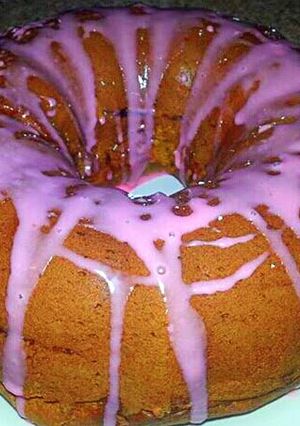 A picture of Strawberry Spice Bundt Cake with Strawberry Glaze.