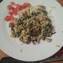 A picture of Eggs with Baby Spinach and Mushrooms.