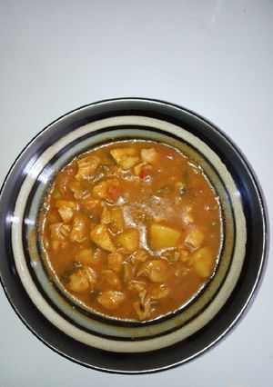 A picture of Boneless chicken and potato stew.