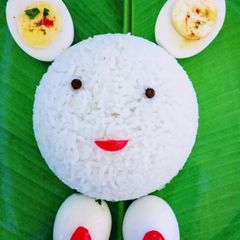 A picture of Rice Doll Emoji.