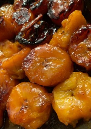 Una foto de Plátanos en tentación con canela y jugo de naranja