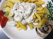 Una foto de crema de choritos