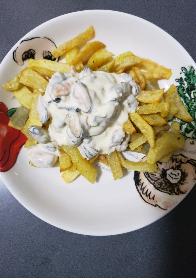Una foto de Salsa de crema-queso con choritos