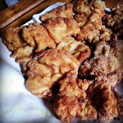 A picture of Fried boneless chicken thighs.