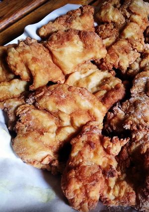 A picture of Fried boneless chicken thighs.