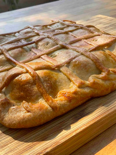 Una foto de Empanada rellena con masa casera