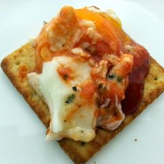 A picture of Baked Egg With Coconut Milk And Pasta Sauce.
