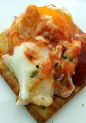 A picture of Baked Egg With Coconut Milk And Pasta Sauce.