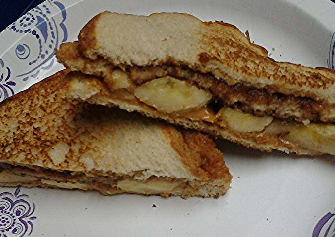 Apple butter peanut butter cashew butter banana sandwich