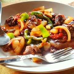 A picture of Pork 🐷 in a gravy 🍛.