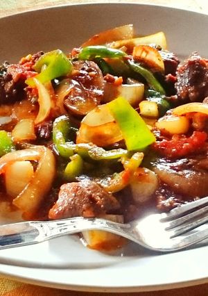 A picture of Pork 🐷 in a gravy 🍛.