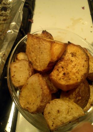 A picture of Baked turnips and rutabega with shallots.