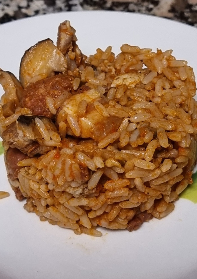 Una foto de Arroz con ibéricos y setas