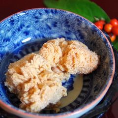 A picture of Simmered Sea Bream Roe for Osechi Beautiful Blossoming Flowers.