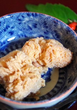 A picture of Simmered Sea Bream Roe for Osechi Beautiful Blossoming Flowers.