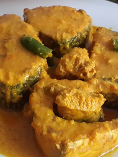 A picture of Doi shorshe ilish (Hilsa with yogurt mustard paste).
