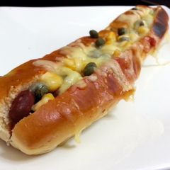A picture of Pizza Beans In Hotdog Bun.