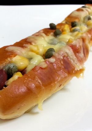 A picture of Pizza Beans In Hotdog Bun.
