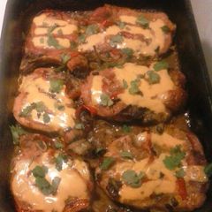 A picture of Mexican style smothered pork chops.