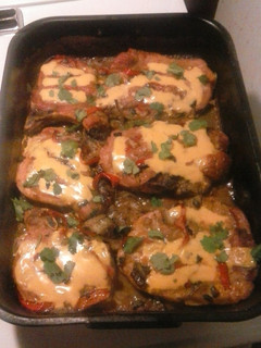 A picture of Mexican style smothered pork chops.