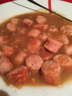 Una foto de Longaniza en salsa de vino