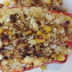 A picture of Couscous and Feta Stuffed Red Peppers.
