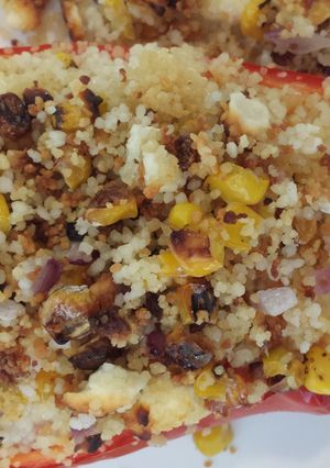 A picture of Couscous and Feta Stuffed Red Peppers.